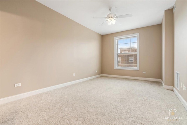 435 W Wood St Unit 410A, Palatine, IL 60067 - empty room featuring a ceiling fan, light colored carpet, and baseboards