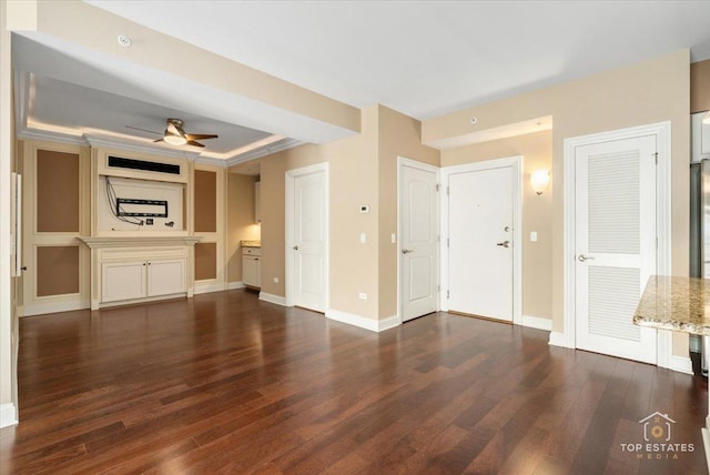 435 W Wood St Unit 410A, Palatine, IL 60067 - unfurnished living room with dark wood-type flooring, a ceiling fan, and baseboards