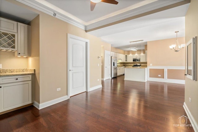 435 W Wood St Unit 410A, Palatine, IL 60067 - unfurnished living room with dark wood-style floors, a ceiling fan, a chandelier, baseboards, and ornamental molding