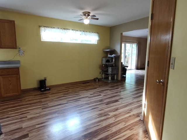 303 Lamplighter Loop, Poplar Grove, IL 61065 - unfurnished dining area featuring light wood-style flooring and ceiling fan