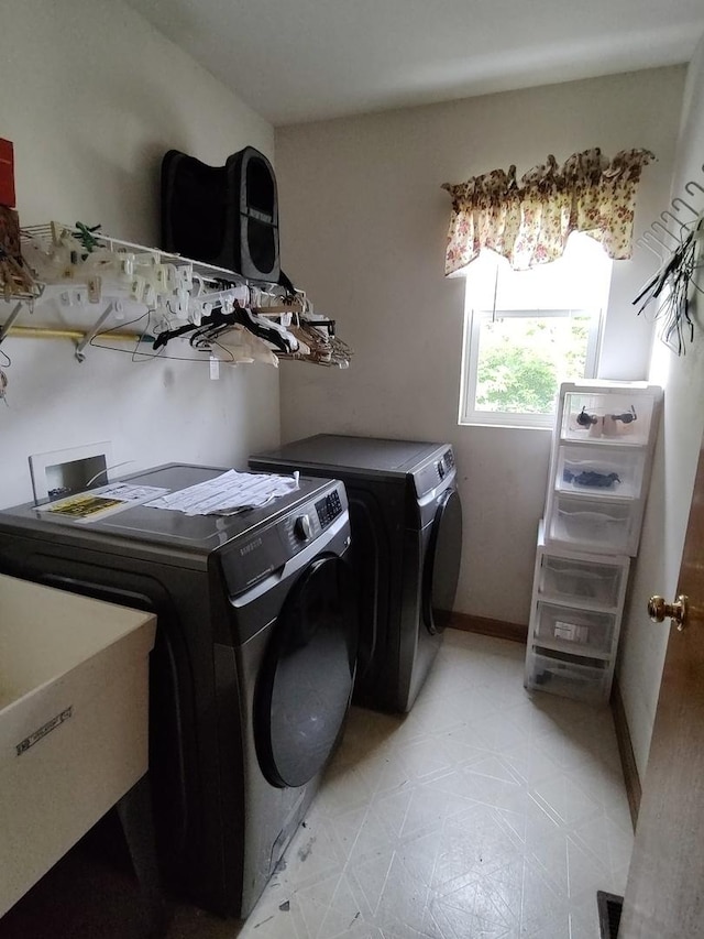 303 Lamplighter Loop, Poplar Grove, IL 61065 - washroom with washer and clothes dryer and light flooring