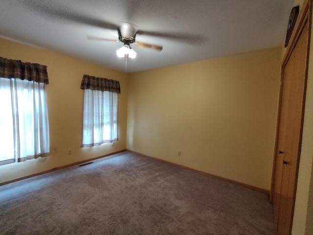 303 Lamplighter Loop, Poplar Grove, IL 61065 - spare room with carpet, a ceiling fan, and baseboards