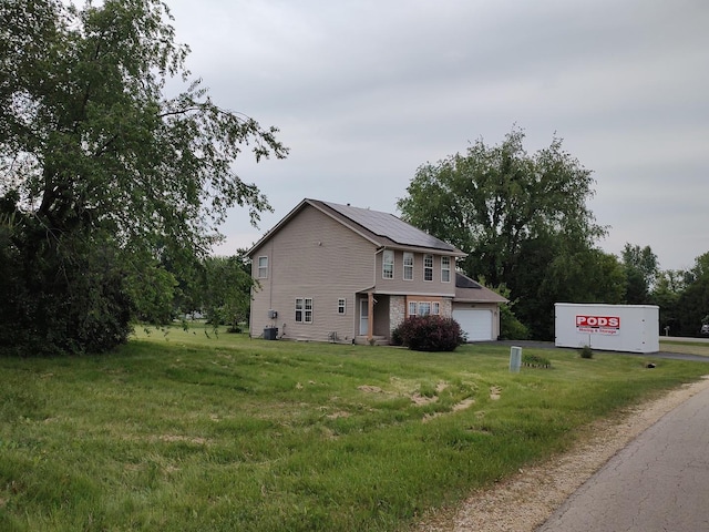 303 Lamplighter Loop, Poplar Grove, IL 61065 - view of side of property with a yard, solar panels, and central air condition unit