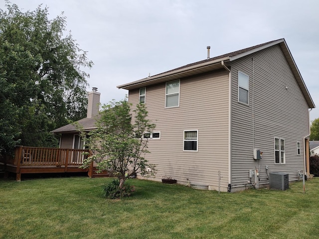 303 Lamplighter Loop, Poplar Grove, IL 61065 - rear view of property with central AC unit, a lawn, a deck, and a chimney