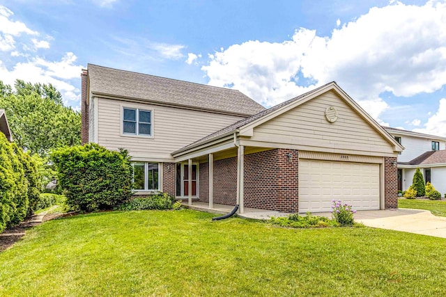 2965 Keystone Rd, Northbrook, IL 60062 - traditional home with a garage, a front lawn, driveway, brick siding, and roof with shingles