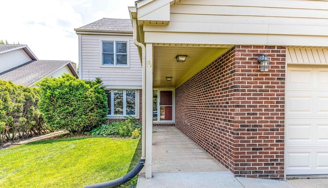 2965 Keystone Rd, Northbrook, IL 60062 - entrance to property with a garage and brick siding