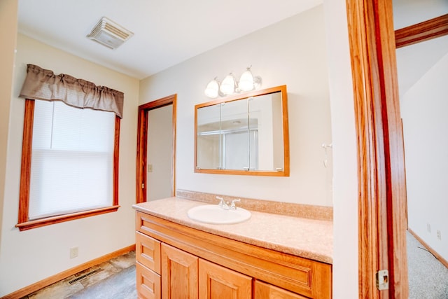 538 E Mulberry St, Watseka, IL 60970 - bathroom with vanity and baseboards