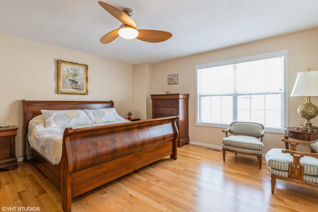 6812 Meadow Ln, Morton Grove, IL 60053 - bedroom with light wood-style flooring and ceiling fan