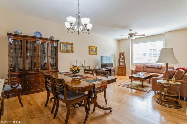 6812 Meadow Ln, Morton Grove, IL 60053 - dining space with light wood-style flooring and a chandelier