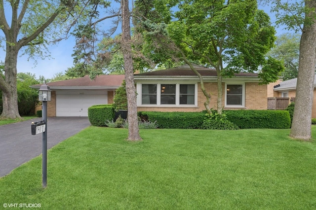1410 Plymouth Ln, Glenview, IL 60025 - single story home with an attached garage, driveway, brick siding, and a front yard