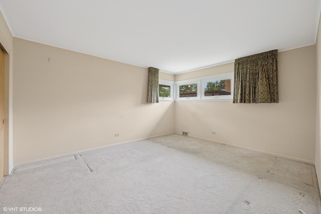 1410 Plymouth Ln, Glenview, IL 60025 - carpeted empty room featuring baseboards