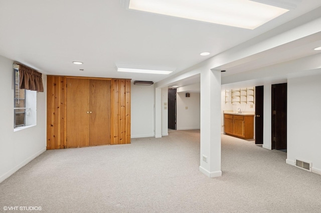 1410 Plymouth Ln, Glenview, IL 60025 - finished basement with light colored carpet and recessed lighting