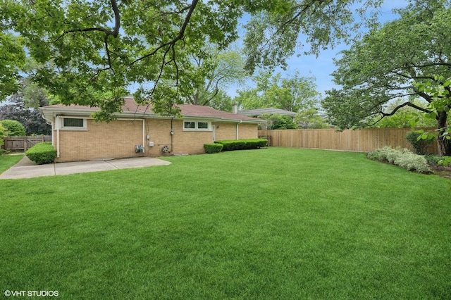 1410 Plymouth Ln, Glenview, IL 60025 - fenced backyard featuring a patio