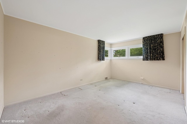 1410 Plymouth Ln, Glenview, IL 60025 - carpeted empty room featuring ornamental molding