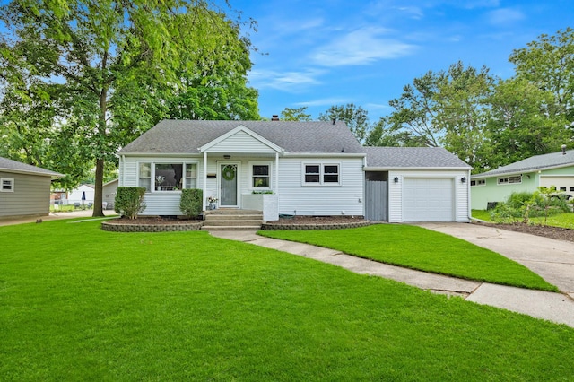 1005 N Walnut St, Normal, IL 61761 - view of front of house with driveway, a front yard, a garage, and a shingled roof