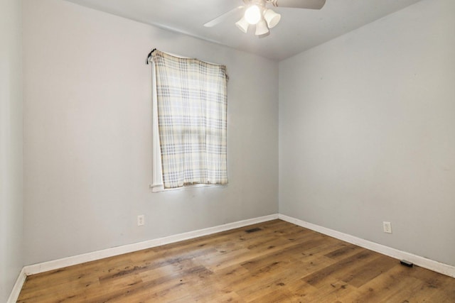 8136 S Manistee Ave, Chicago, IL 60617 - spare room with ceiling fan and wood finished floors