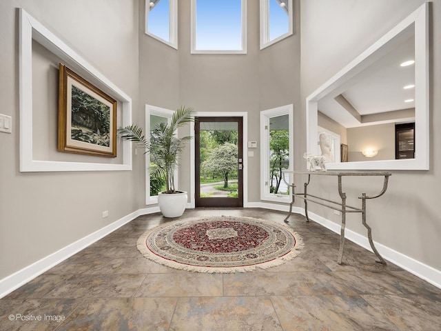 28W535 Purnell Rd, West Chicago, IL 60185 - entrance foyer with stone finish flooring and a towering ceiling
