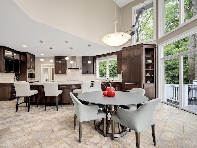 28W535 Purnell Rd, West Chicago, IL 60185 - dining area featuring a towering ceiling and recessed lighting