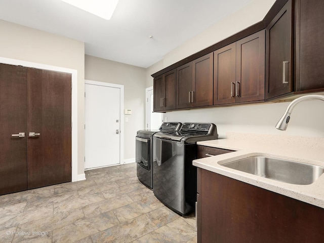 28W535 Purnell Rd, West Chicago, IL 60185 - laundry room with cabinet space, washing machine and dryer, and light stone finish floors