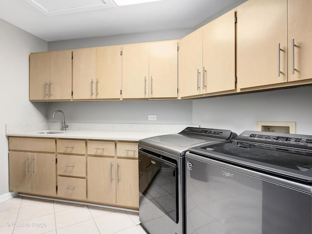 28W535 Purnell Rd, West Chicago, IL 60185 - laundry room featuring independent washer and dryer, light tile patterned floors, and cabinet space