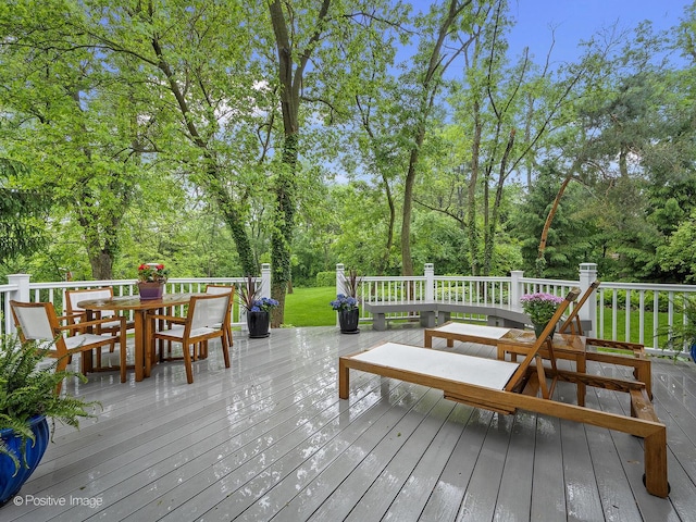 28W535 Purnell Rd, West Chicago, IL 60185 - wooden terrace featuring outdoor dining area and view of wooded area