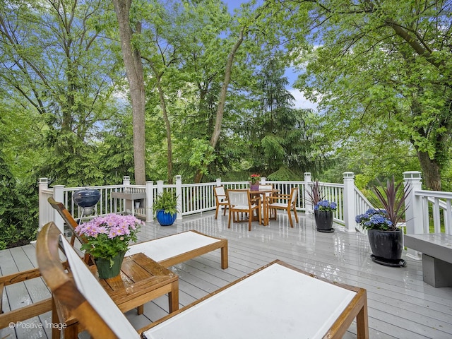 28W535 Purnell Rd, West Chicago, IL 60185 - deck featuring outdoor dining area and view of wooded area