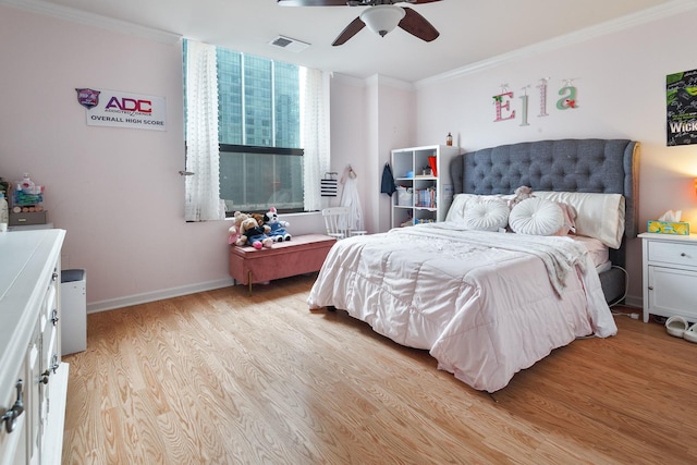 910 S Michigan Ave Unit 1411, Chicago, IL 60605 - bedroom featuring light wood-style flooring, ornamental molding, and ceiling fan