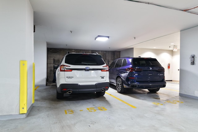 910 S Michigan Ave Unit 1411, Chicago, IL 60605 - parking garage featuring baseboards