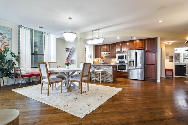 910 S Michigan Ave Unit 1411, Chicago, IL 60605 - dining space featuring dark wood finished floors, recessed lighting, and a chandelier