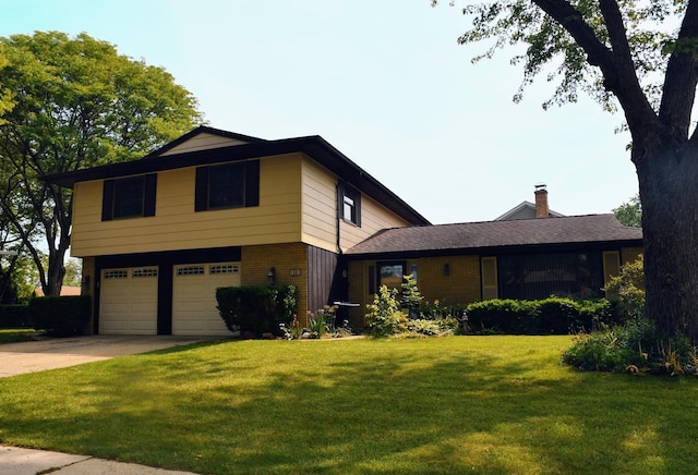 1301 Fairlane Dr, Schaumburg, IL 60193 - view of front of property with brick siding, a front yard, an attached garage, and driveway