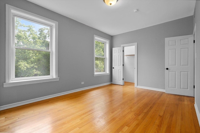 5000 N Glenwood Ave Unit 2, Chicago, IL 60640 - unfurnished bedroom featuring light wood-type flooring and a closet