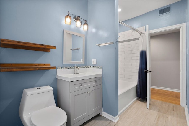 5000 N Glenwood Ave Unit 2, Chicago, IL 60640 - full bath with wood finished floors, vanity, and shower / bath combination with curtain