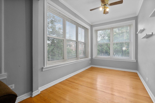 5000 N Glenwood Ave Unit 2, Chicago, IL 60640 - empty room with a ceiling fan, light wood-style floors, and ornamental molding