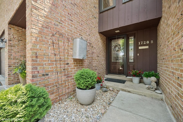 1728 Wildberry Dr Unit B, Glenview, IL 60025 - view of exterior entry with board and batten siding and brick siding