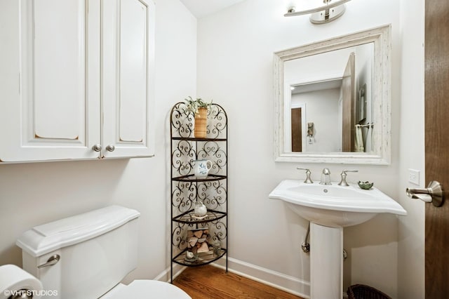1728 Wildberry Dr Unit B, Glenview, IL 60025 - bathroom featuring toilet and wood finished floors