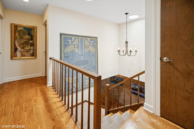 1728 Wildberry Dr Unit B, Glenview, IL 60025 - stairs featuring wood finished floors, a chandelier, and recessed lighting