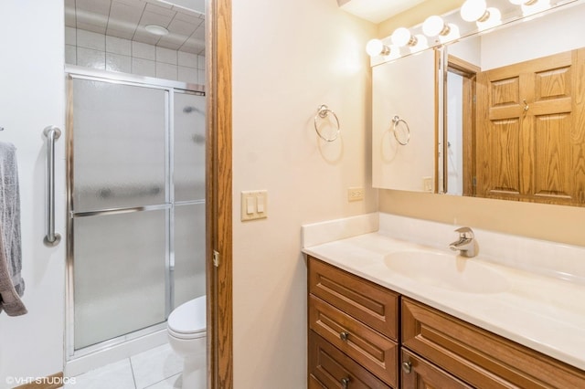 579 Figard Ln, Des Plaines, IL 60016 - bathroom featuring vanity, a shower stall, and tile patterned floors
