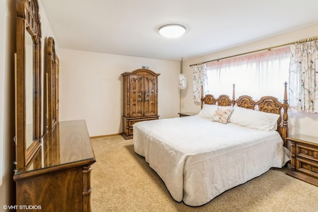 579 Figard Ln, Des Plaines, IL 60016 - bedroom featuring light carpet and baseboards
