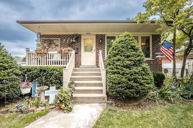 14322 Kolin Ave, Midlothian, IL 60445 - bungalow-style house featuring covered porch and brick siding