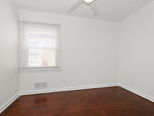 142 W Brayton St, Chicago, IL 60628 - spare room featuring wood finished floors, baseboards, and ceiling fan