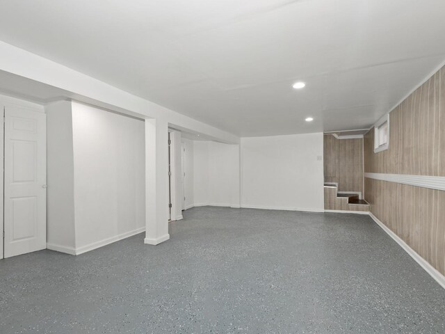 142 W Brayton St, Chicago, IL 60628 - finished basement with stairs, baseboards, recessed lighting, and wood walls