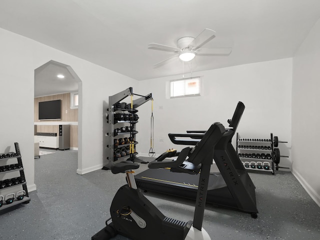 142 W Brayton St, Chicago, IL 60628 - workout area featuring ceiling fan, arched walkways, and baseboards