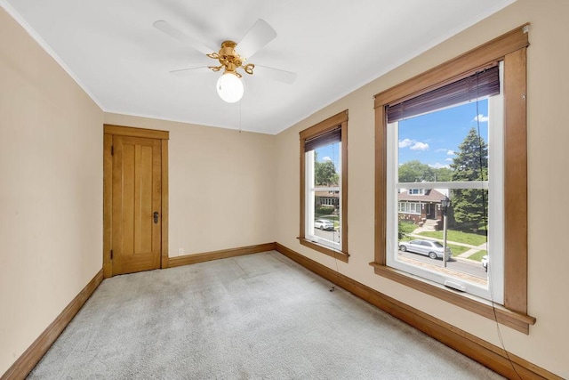 3235 Cuyler Ave, Berwyn, IL 60402 - unfurnished room featuring light colored carpet, ceiling fan, and ornamental molding