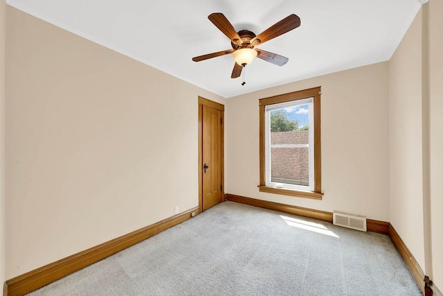3235 Cuyler Ave, Berwyn, IL 60402 - unfurnished room with light carpet and ceiling fan
