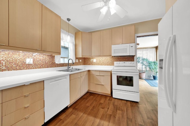 3235 Cuyler Ave, Berwyn, IL 60402 - kitchen featuring white appliances, light brown cabinets, wood finished floors, and healthy amount of natural light
