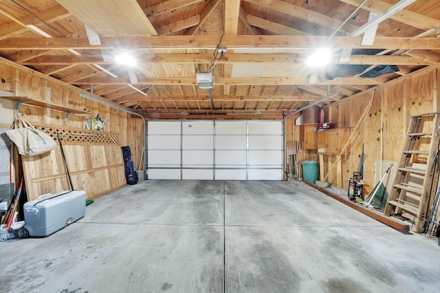 3235 Cuyler Ave, Berwyn, IL 60402 - garage featuring a garage door opener and wooden walls
