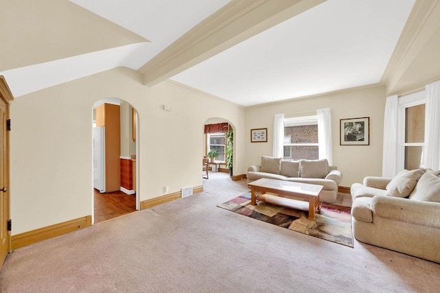 3235 Cuyler Ave, Berwyn, IL 60402 - living room featuring arched walkways, carpet, and crown molding