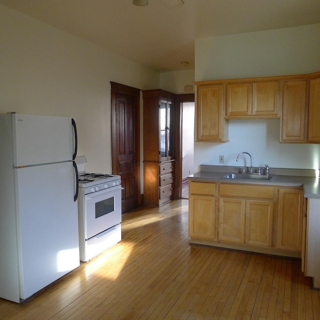 1020 N Wood St, Chicago, IL 60622 - kitchen with white appliances, light wood-style flooring, and light brown cabinetry