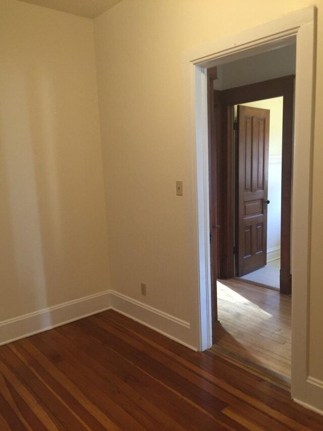 1020 N Wood St, Chicago, IL 60622 - empty room featuring dark wood-style floors
