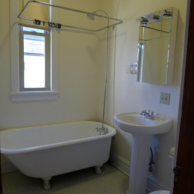 1020 N Wood St, Chicago, IL 60622 - full bathroom with a freestanding tub and tile patterned floors